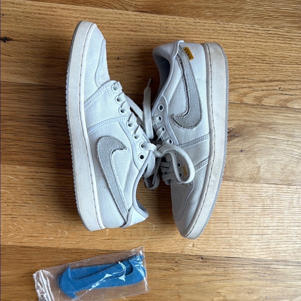 Nike Air Jordan White Canvas Sneakers